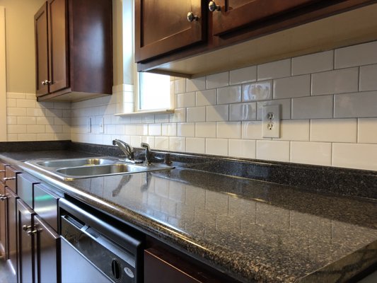 Finished kitchen tile and counter work from a public HandyNASH listing